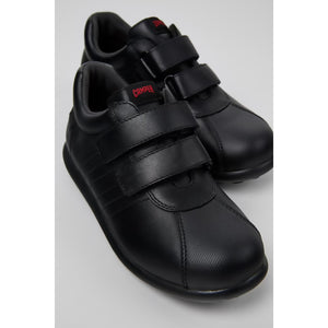 Front view of the Camper black calfskin leather school shoe for kids.