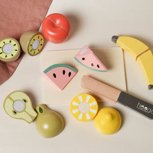 Vibrant multicolour wooden fruit toys for sorting and colour recognition learning.