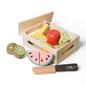 Safe and non-toxic wooden fruit toys in a basket for sorting and learning.
