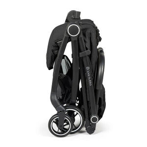 Compact fold of the Ickle Bubba Aries Max Auto Fold Stroller in black, ideal for storing in small spaces or transporting on the go.