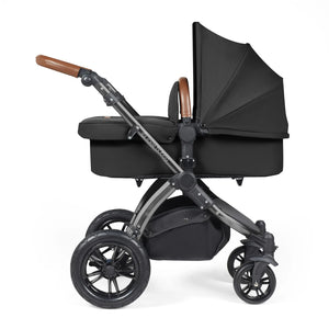 Side view of the Ickle Bubba pushchair with carry cot.