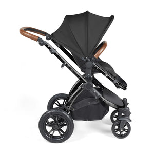 Ickle Bubba Stomp Luxe pushchair in black and tan colour handles