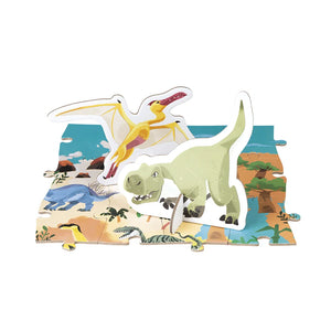 Close-up of dinosaur puzzle pieces and booklet