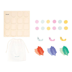 A complete set including round cards, square grass cards, snail bodies, shells, and salad leaves.