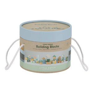 After play, the wooden blocks are carefully placed in a barrel.