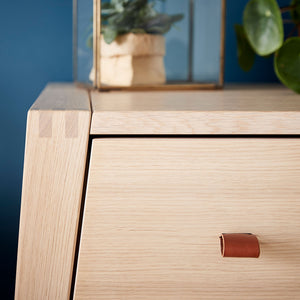 Close-up of soft leather handles on Leander Linea dresser
