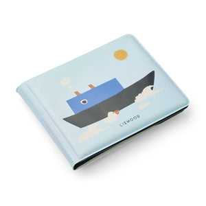 Liewood Waylon Sailing Magic Water Book set with toy boat and swim ring accessories.