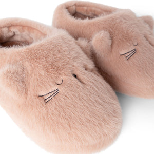 A close-up view of the pale pink Liewood Aviaja cat slippers, focusing on the cute embroidered closed eyes, whiskers, and fluffy pointed ears.