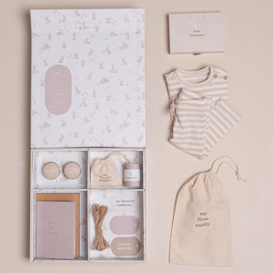 Baby's dummy and keepsakes placed inside a dedicated storage bag.