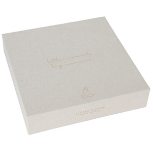 Beige linen-covered baby memory box with "Little moments, big memories" quote.