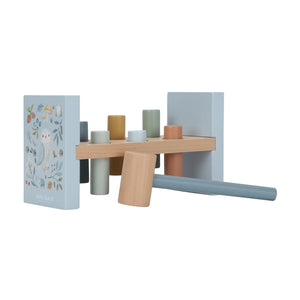 A wooden Little Dutch pounding bench toy with colorful pegs and a wooden mallet, designed with cute Forest Friends illustrations.