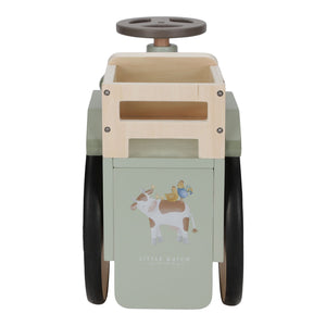 Farm-themed wooden tractor toy for balance and play.
