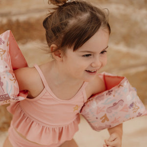 Little Dutch safety pink swim aids for toddlers with colorful design.