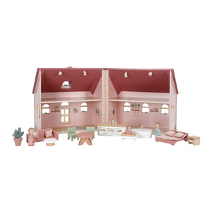 Dollhouse playset with living room, kitchen, bedroom, and bathroom.