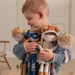 : A cuddly blue superhero doll for children, designed for imaginative play and comfort.