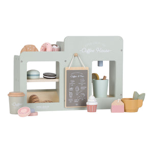 The reverse side of the Little Dutch Coffee Corner set isolated on a white background, highlighting the serving counter and dark grey menu board.