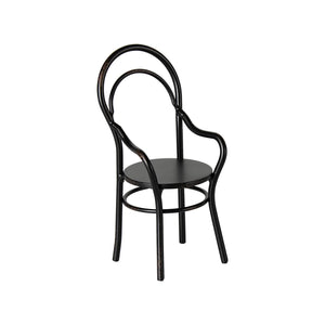 Miniature single chair in a white background.