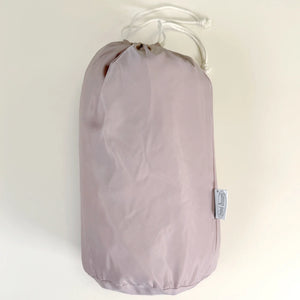MiniDream double uses a playmat store in a baby pink bag.