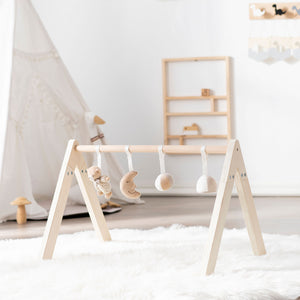 MiniDream minimalist baby play gym frame with hanging toys