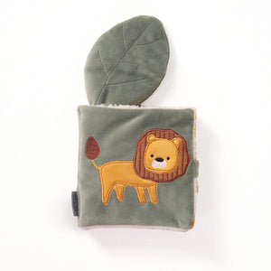 Full view of the square-shaped MiniDream baby activity book showcasing the soft green polyester and cotton fabric with a lion design.