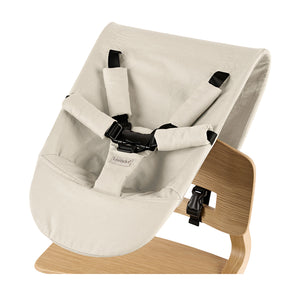 Newborn seat for Leander highchair with 5 harness point in cappuccino colour.