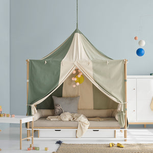 Oliver Furniture Camp Bed Canopy Sahara made from semi-transparent organic muslin cotton over a children’s bed