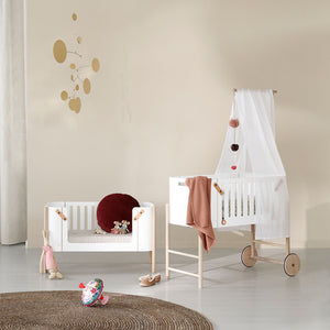 Elegant nursery setup with warm, simple and soothing atmosphere