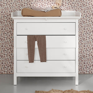 Open drawer showing spacious storage for baby clothes, diapers, and nursery essentials