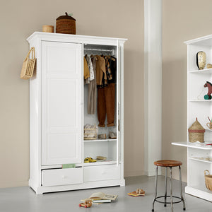 Interior layout with shelves, hanging rail, and bottom drawers