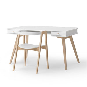 Matching wooden armchair with curved backrest and smooth edges
