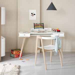 Matching wooden armchair with curved backrest and smooth edges