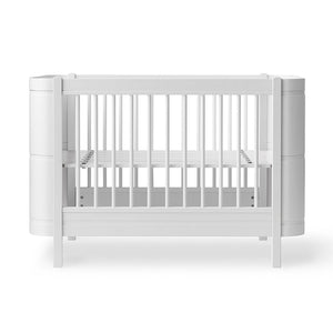 Cot bed with mattress dimensions 68×122 cm, suitable for mattress up to 14 cm thick