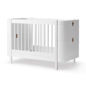 Compact Mini+ cot bed that fits smaller rooms without compromising style