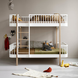 Modern kids’ bunk bed with 1950s-inspired design and rounded corners.