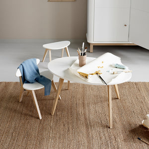 Small toddler table designed for play, drawing, and activities.