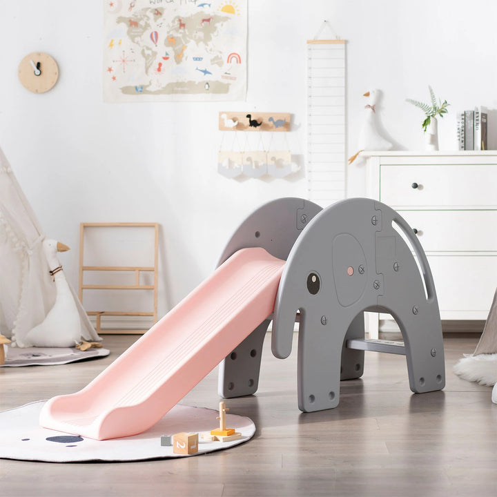 Pink elephant slide set up in a modern living room with natural light.