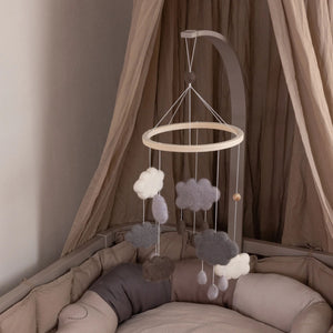 Sebra Wooden Mobile Holder paired with a hanging baby mobile.