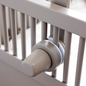 Side angle of Sebra wooden mobile holder showing clamping mechanism.