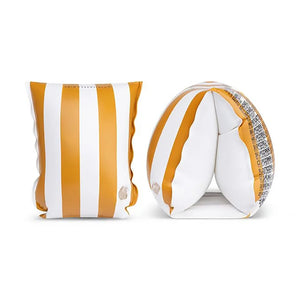 Kids swim arm bands in a white background.