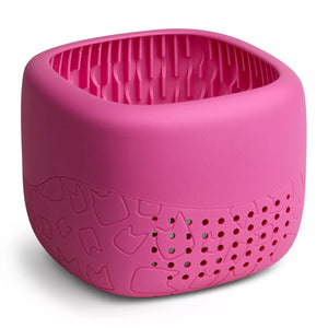 Berry Pink Toniebox Lite silicone cover showing speaker holes, soft grip surface.