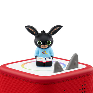 Bing audio character placed magnetically on top of a Toniebox player.