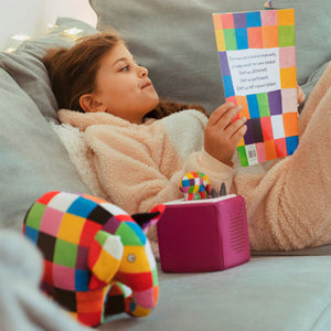 Children listening to Elmer stories on Toniebox