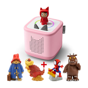 A Cloud Pink Toniebox 2 audio player with a red Creative-Tonie on top, surrounded by four Tonie figures: Paddington Bear, a red T-Rex dinosaur, Spider-Man, and the Gruffalo.