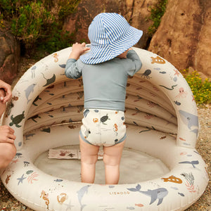 This liewood canopy pool offers enjoyable water play with a soft, cushioned bottom for your little one.