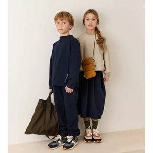 Children sporting clothes and accessories from Liewood