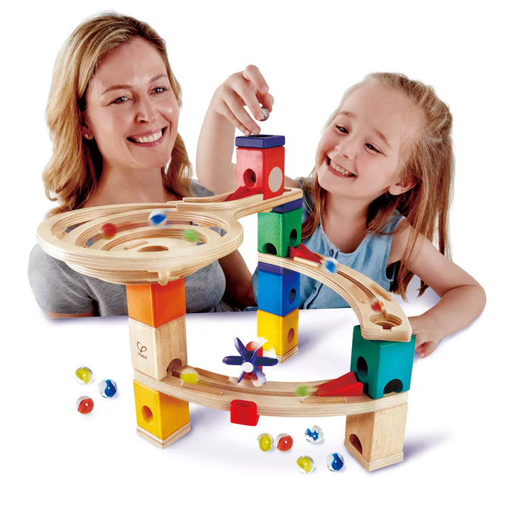 Child playing with marble run