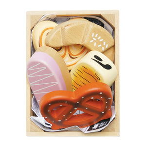 Wooden croissant, pretzel, and iced bun toys