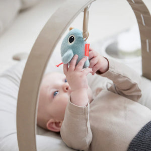 Done by Deer Raffi Cozy Lounger Baby Nest with Activity Arch - Sand