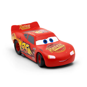 A plastic toy figure of the character Lightning McQueen from Disney's Cars movie, designed in red with detailing and stickers resembling a race car.