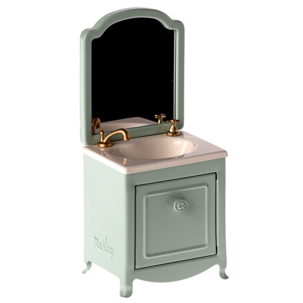 Bathroom vanity with mirror and sink on a white background